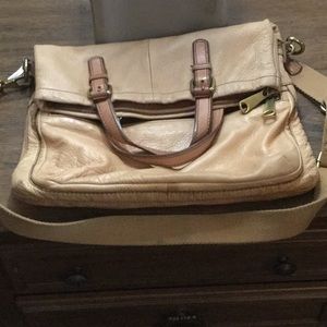 Fossil fold over cross body.